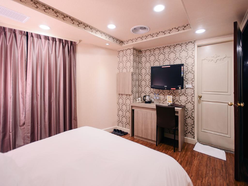 Duke Business Hotel Zhongli Room photo